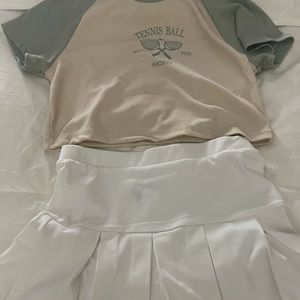 Tennis set green title and sleeves white skirt